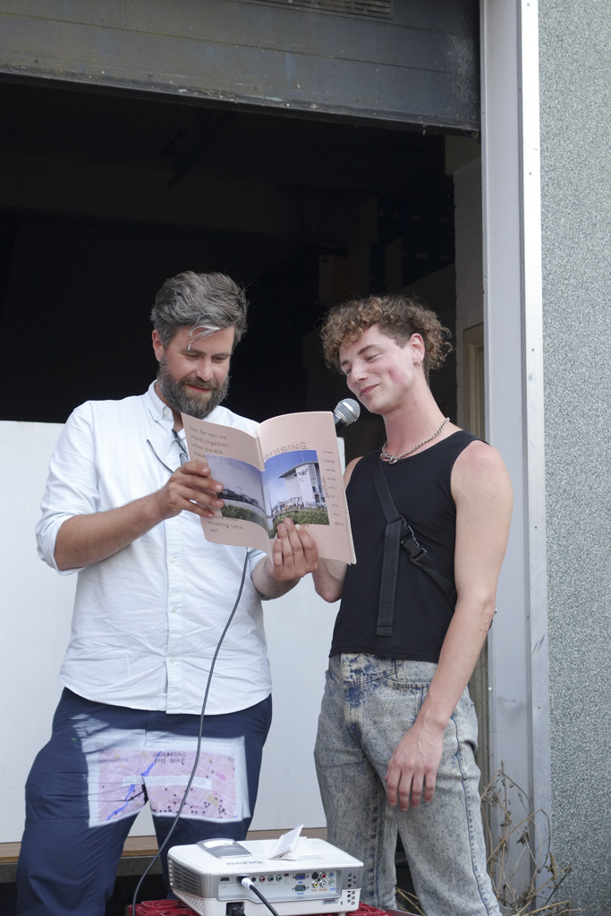 Jaroslav and Lucas reading from the book *Cruising the Map* that came out of the workshop