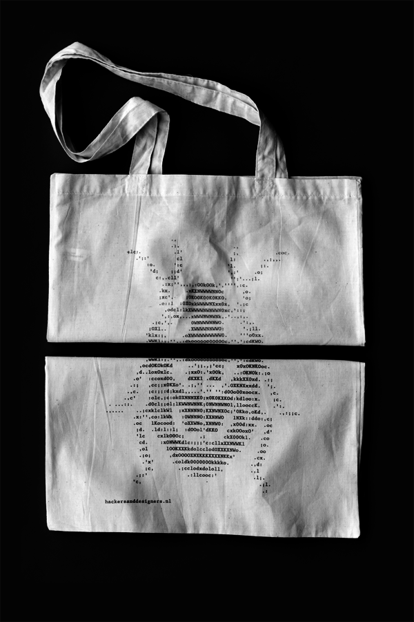 Red print on bio cotton bag. Stink bug ASCII Art by Anja & James, silk screen by Karoline Swiezynski
